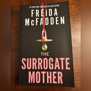 Freida McFadden "The Surrogate Mother" Softcover - Black & Pink Cover